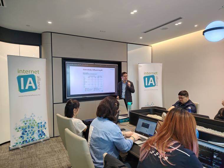 Participants auditing their own brands during the workshop