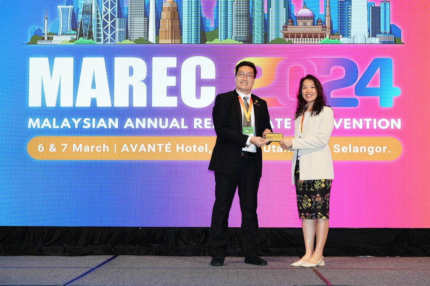 Stephanie Lam speaking on the main stage at MAREC, the Malaysian Annual Real Estate Convention