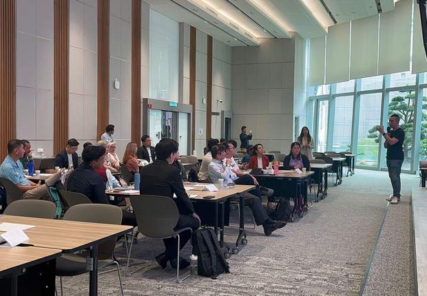 A corporate training room during a live session